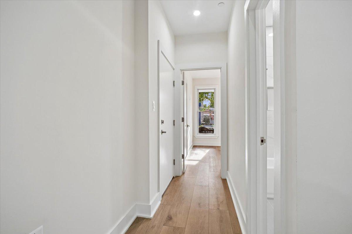 329 16th Street Southeast, Unit 1 Washington, DC 20003 - Photo 3 of 17 Hallway leading to bedroom 1 and bedroom 2.