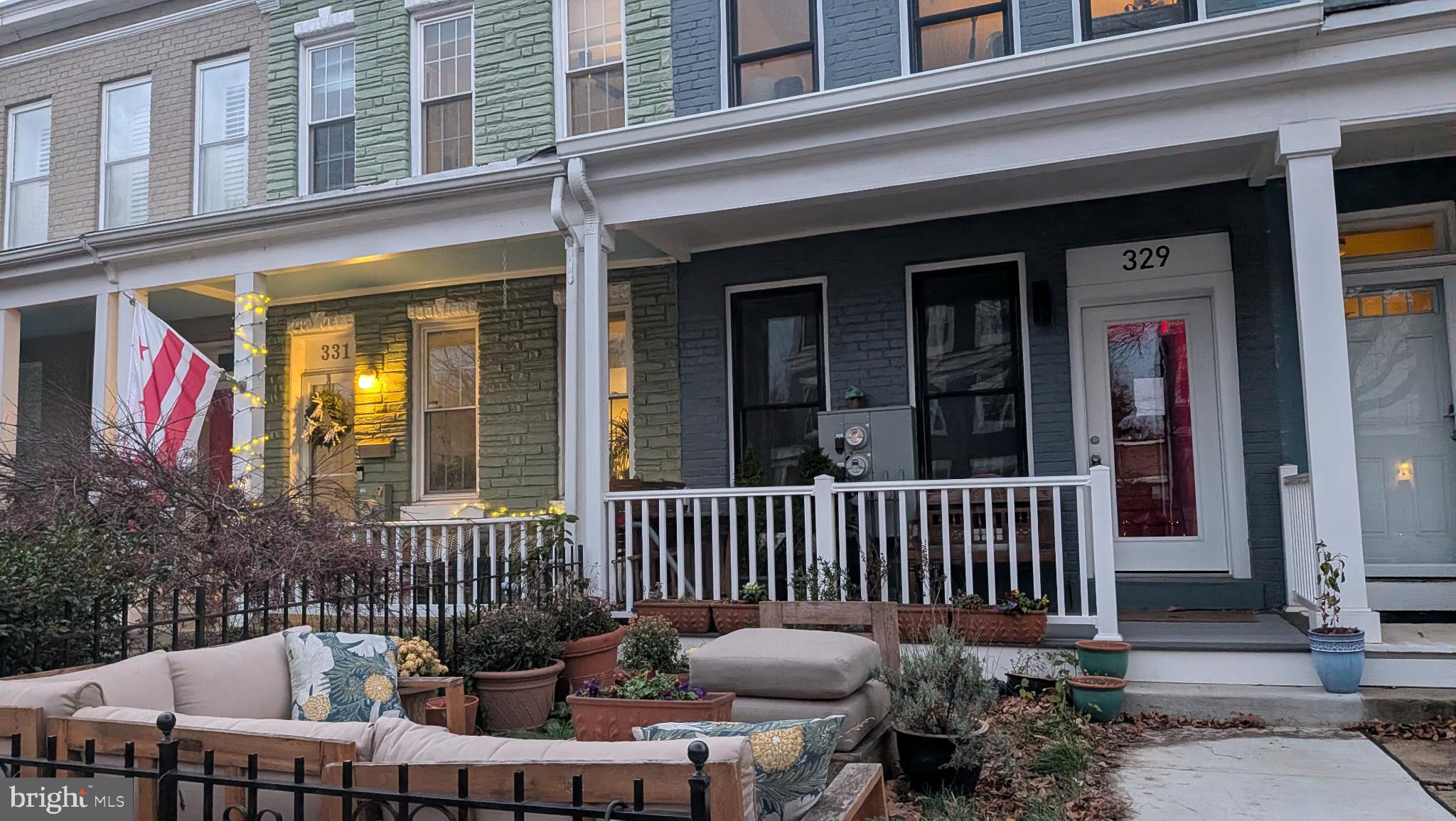 329 16th Street Southeast, Unit 1 Washington, DC 20003 - Photo 3 of 22 a view of a chair and bench in the balcony