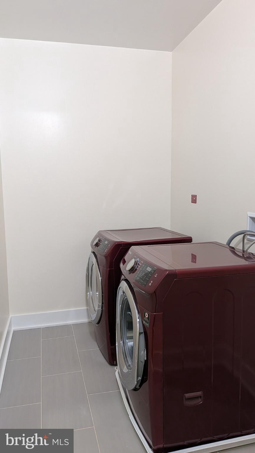 329 16th Street Southeast, Unit 1 Washington, DC 20003 - Photo 10 of 22 a utility room with dryer and washer