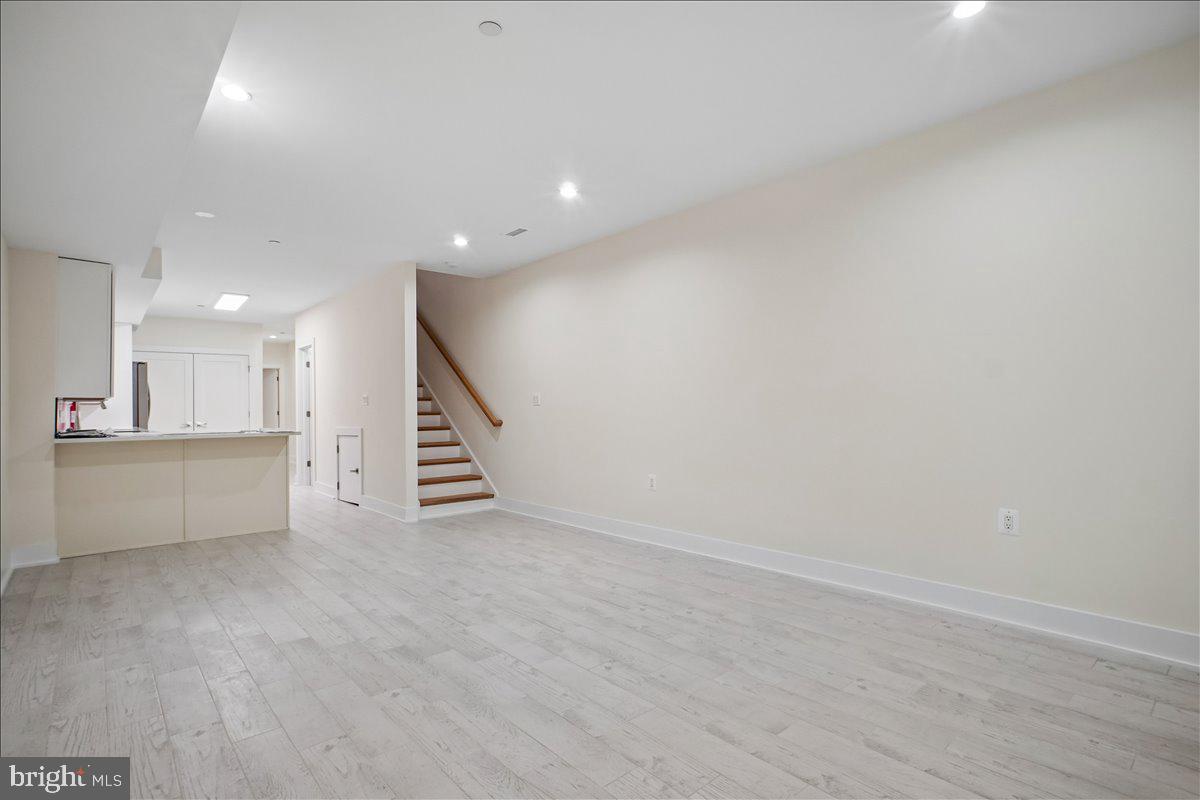 329 16th Street Southeast, Unit 1 Washington, DC 20003 - Photo 10 of 17 Spacious, light-filled living area.