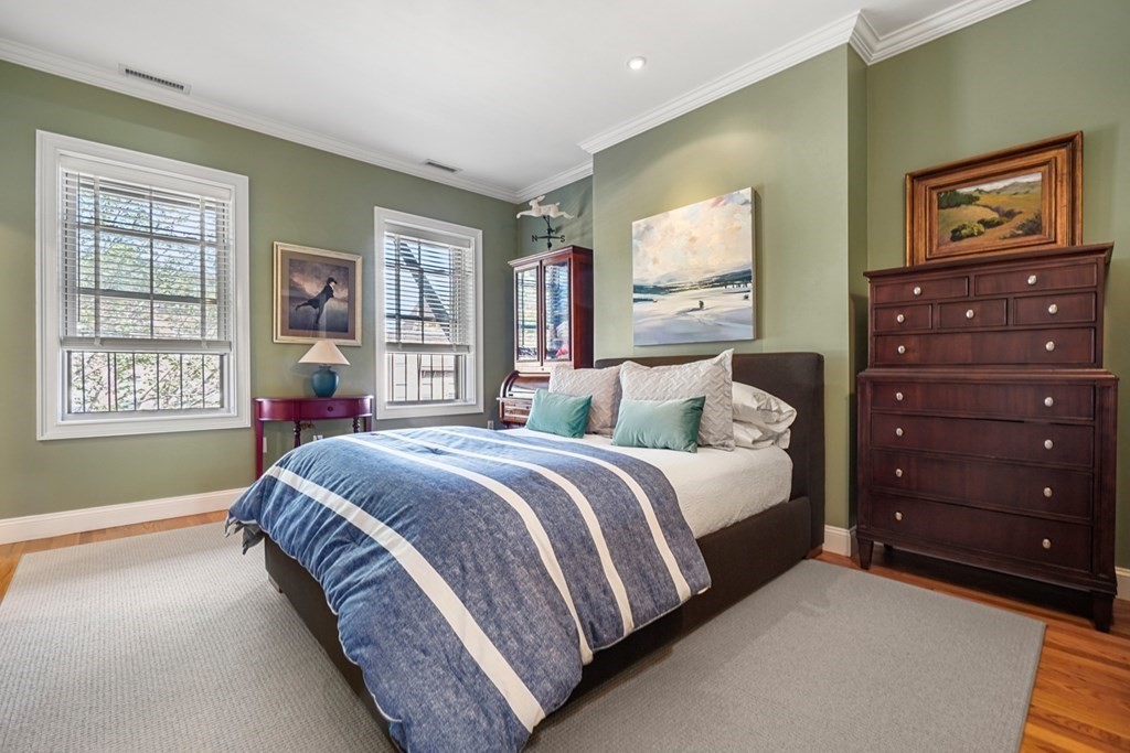 59 Rutland Street, Unit 3 Boston, MA 02118 - Photo 12 of 40 a spacious bedroom with a bed and window