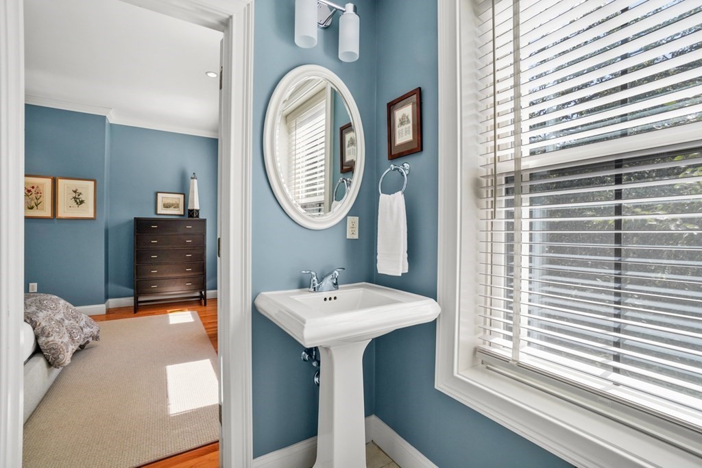 59 Rutland Street, Unit 3 Boston, MA 02118 - Photo 20 of 40 a bathroom with a sink and a mirror