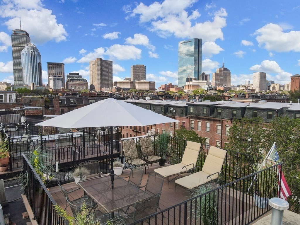 59 Rutland Street, Unit 3 Boston, MA 02118 - Photo 25 of 40 a view of a patio with couches table and chairs