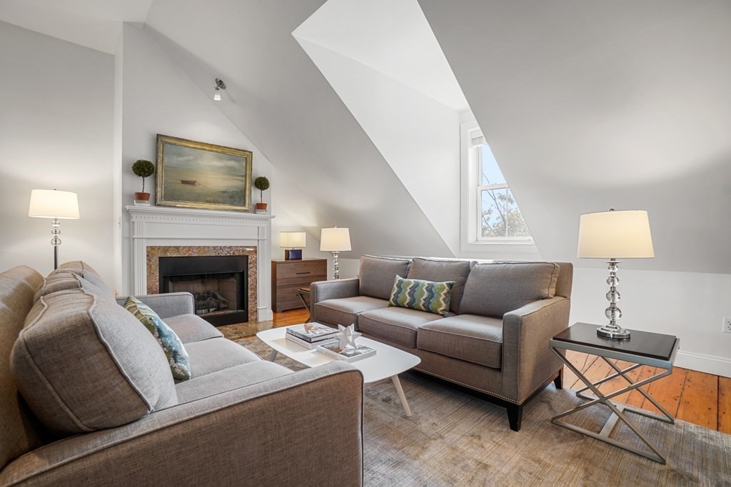 59 Rutland Street, Unit 3 Boston, MA 02118 - Photo 3 of 40 a living room with furniture and a fireplace