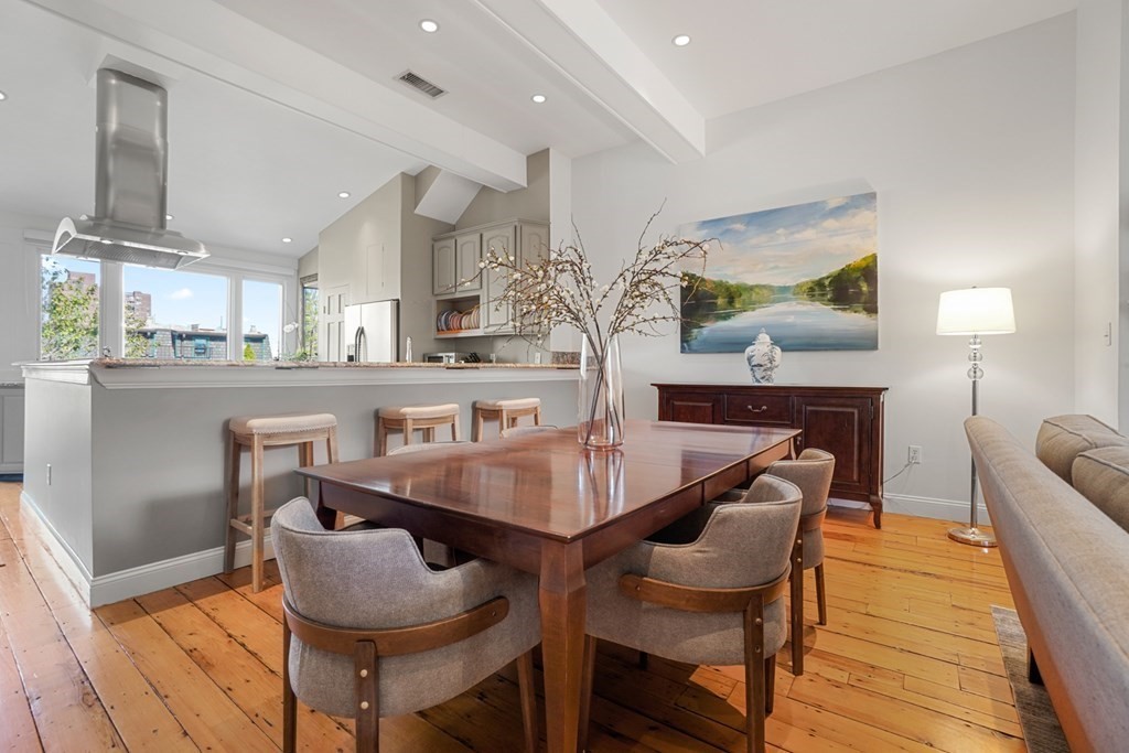 59 Rutland Street, Unit 3 Boston, MA 02118 - Photo 7 of 40 a dining room with furniture and wooden floor