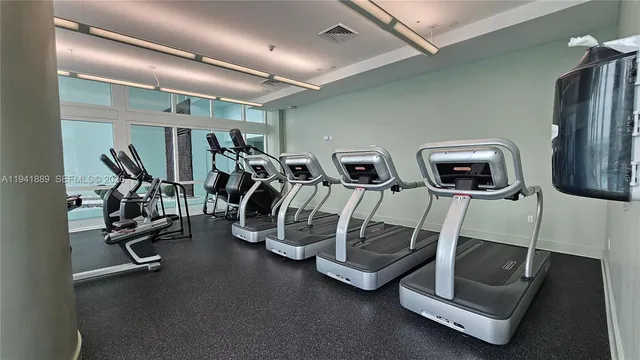 a view of a room with gym equipment