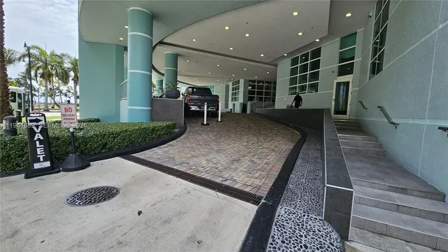 a room with furniture and a large window