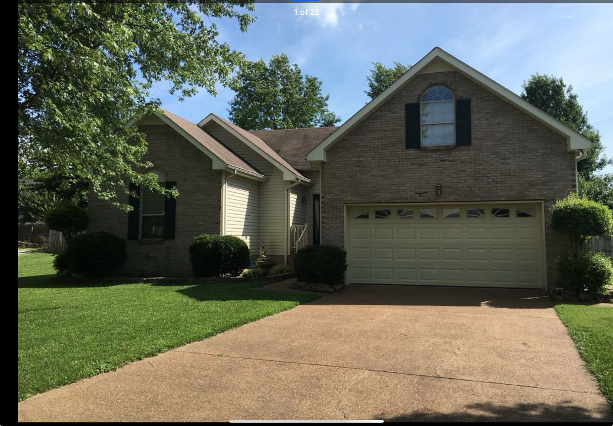 110 Indian Pointe Drive White House, TN 37188 - Photo 1 of 19 a front view of a house with a yard