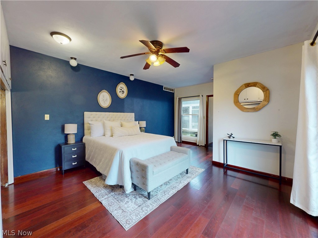 162 South Leavitt Road Amherst, OH 44001 - Photo 17 of 41 Bedroom featuring dark wood-style flooring and ceiling fan