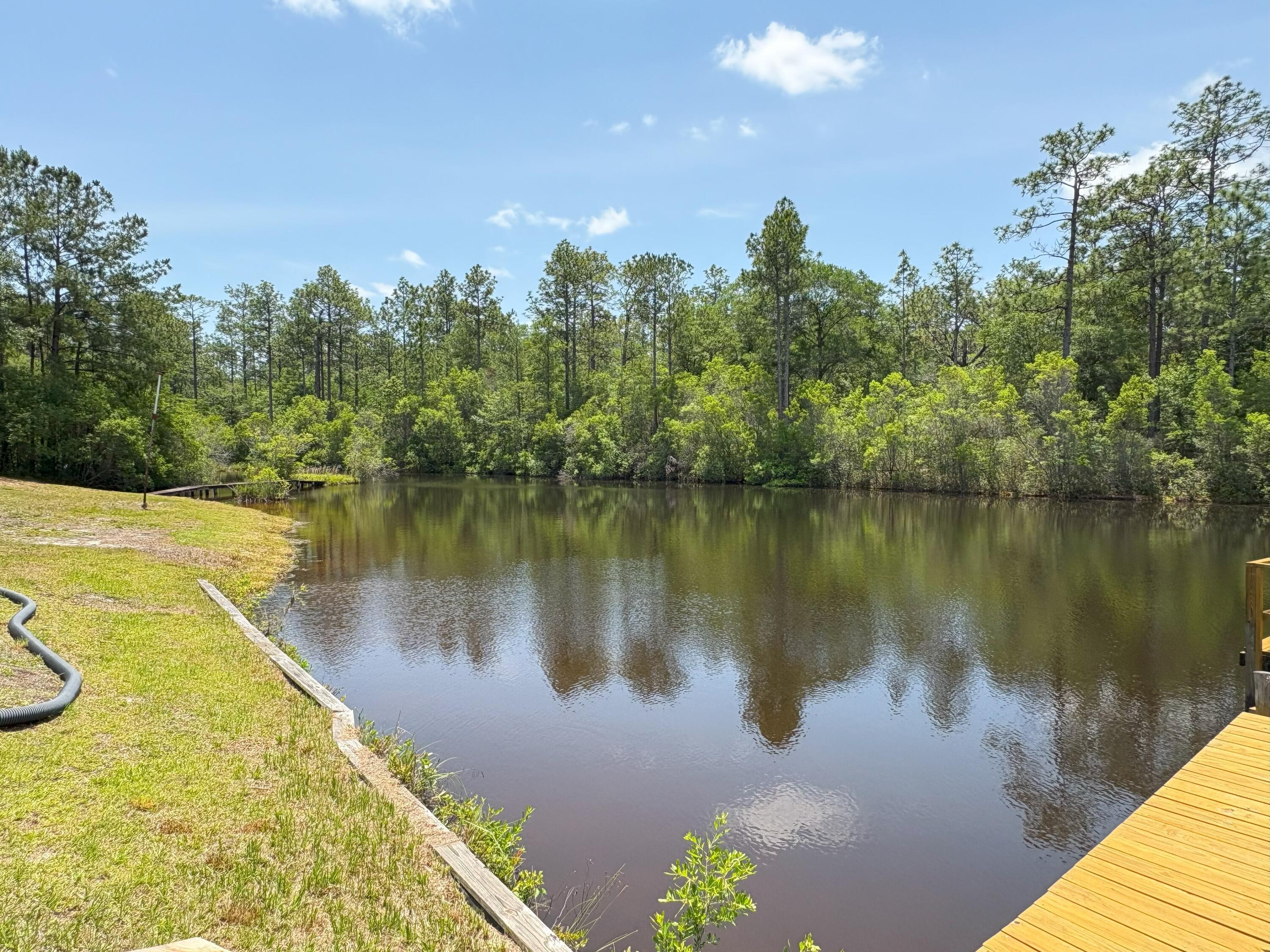 3864 Bear Head Road Crestview, FL 32539 - Photo 38 of 57 a view of a lake
