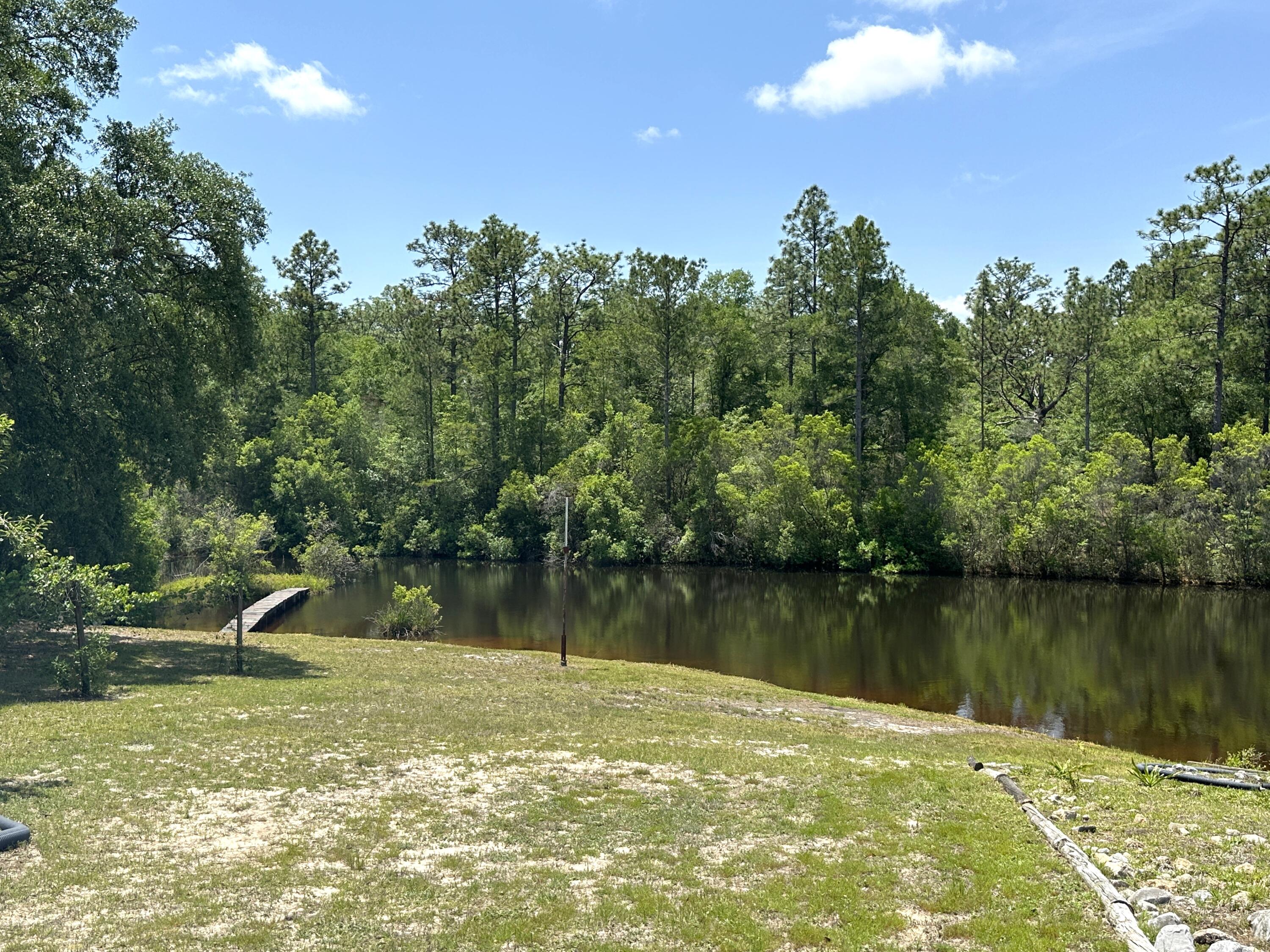3864 Bear Head Road Crestview, FL 32539 - Photo 49 of 57 a view of a lake