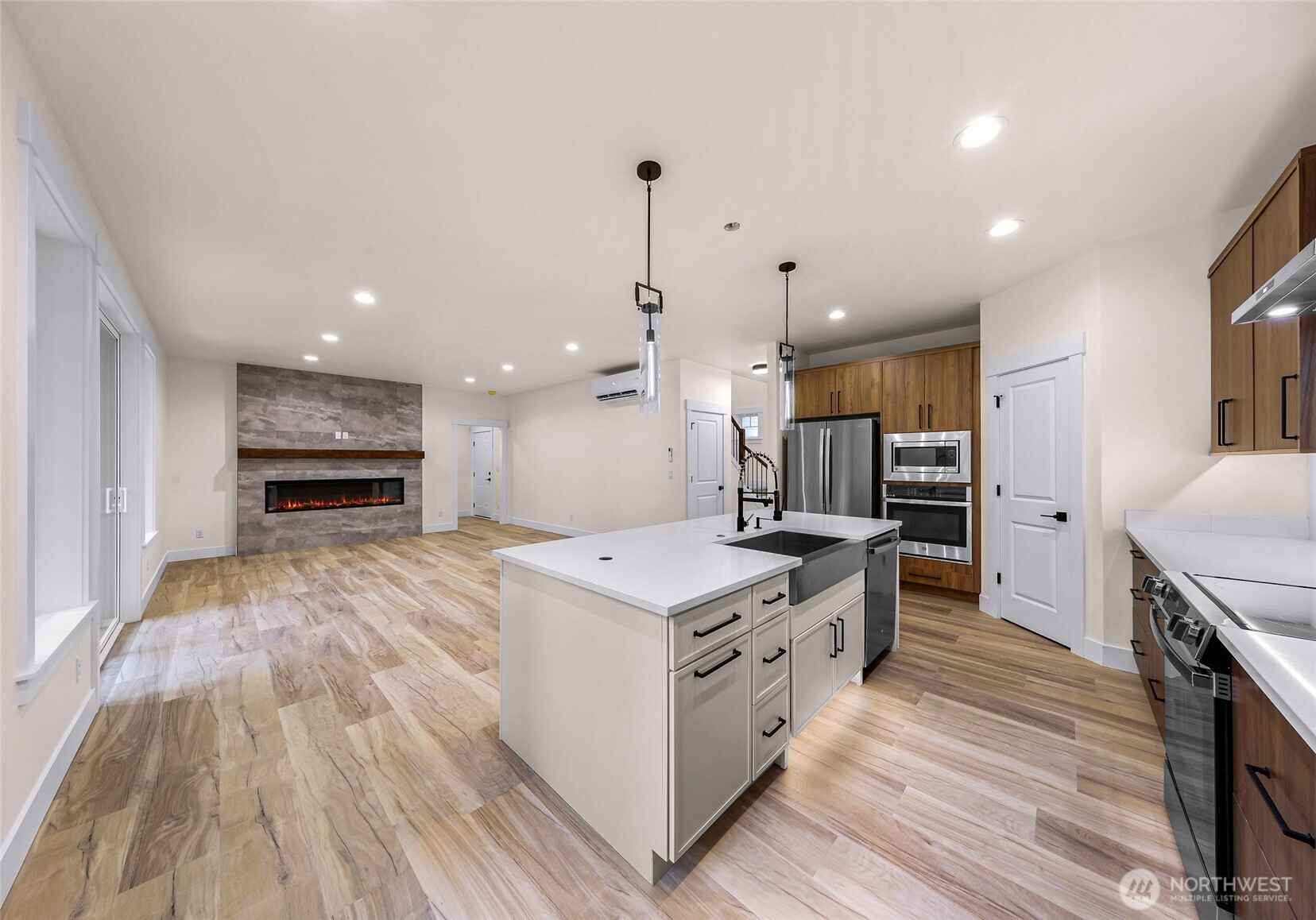 511 West 2nd Street Cle Elum, WA 98922 - Photo 12 of 35 a kitchen with stainless steel appliances granite countertop a stove oven and a refrigerator