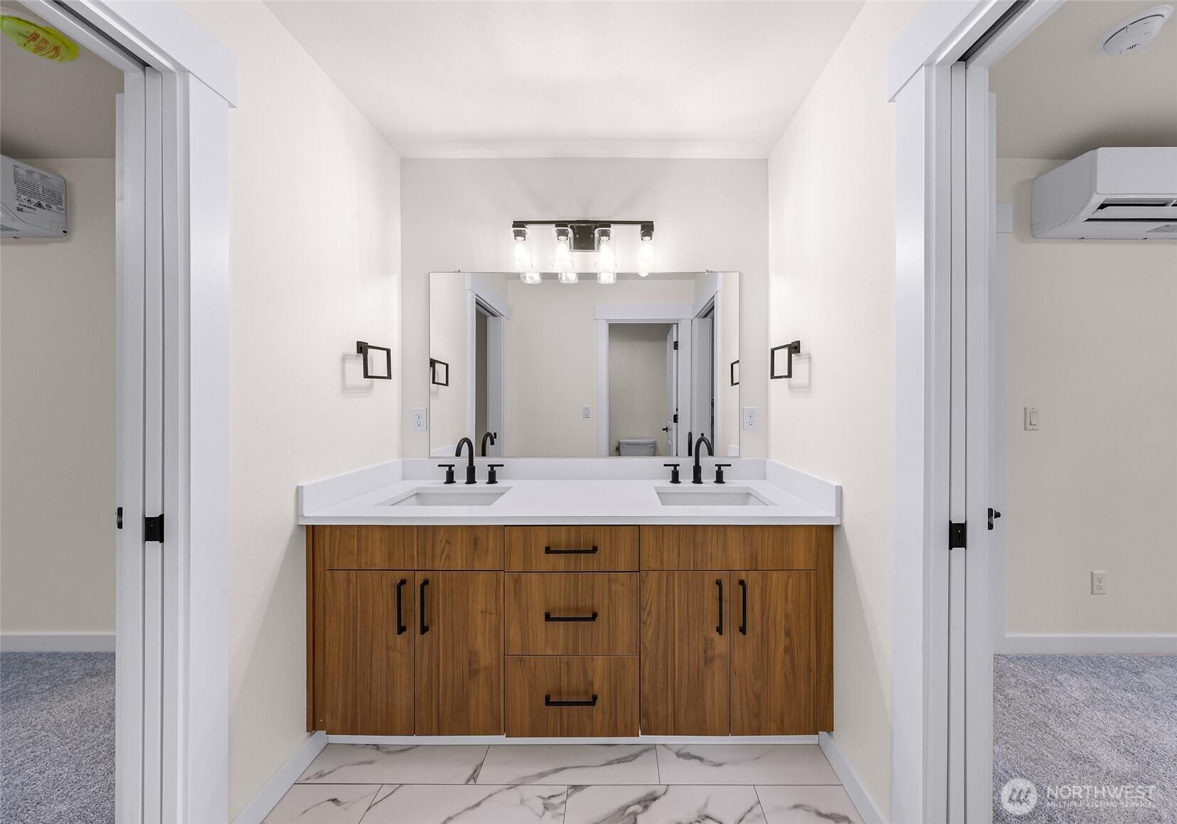 511 West 2nd Street Cle Elum, WA 98922 - Photo 24 of 35 a bathroom with a double vanity sink and mirror