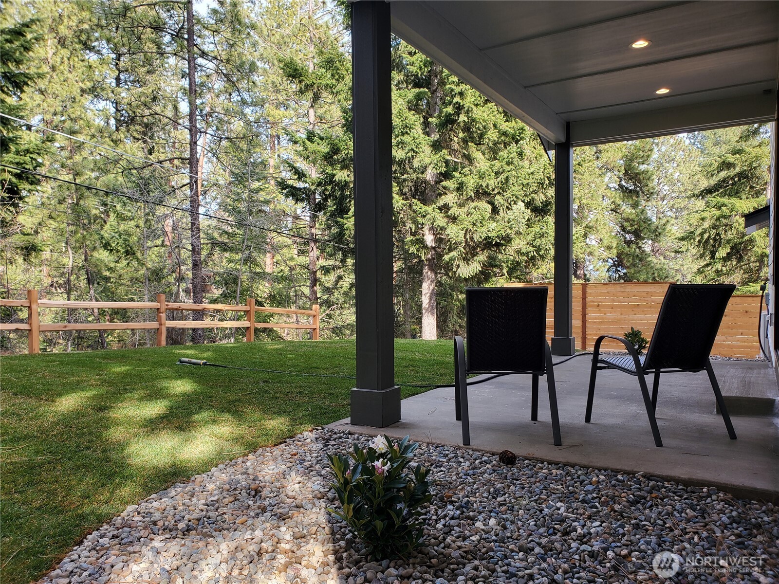 511 West 2nd Street Cle Elum, WA 98922 - Photo 6 of 35 a view of a chairs and table in the garden