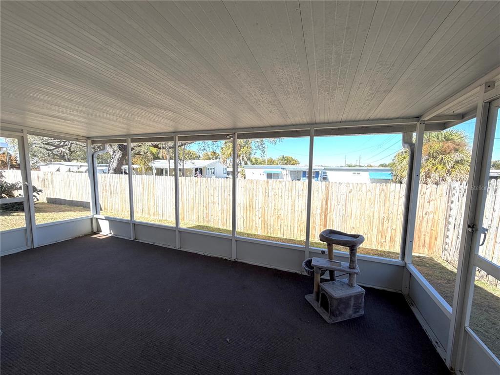 1332 Dew Bloom Road Valrico, FL 33594 - Photo 18 of 22 a living room with furniture and a large window