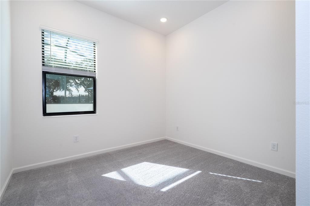 10592 Ebb Tide Lane Orlando, FL 32821 - Photo 30 of 85 an empty room with a window