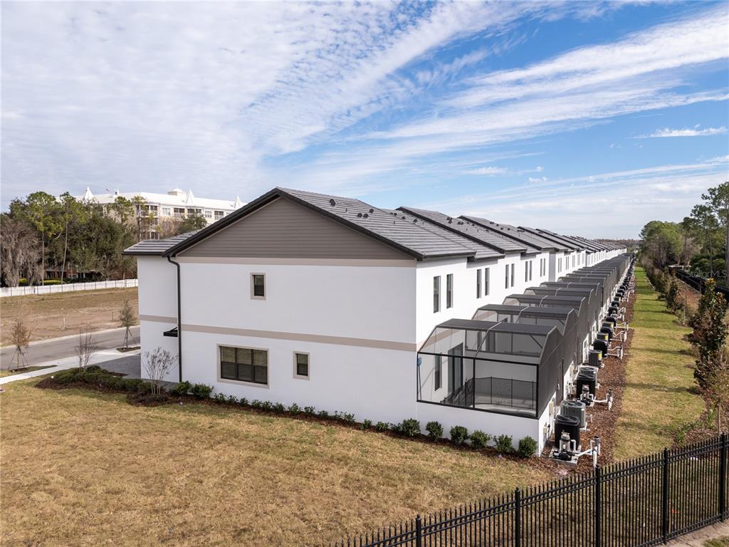 10592 Ebb Tide Lane Orlando, FL 32821 - Photo 4 of 85 a view of a house with wooden fence