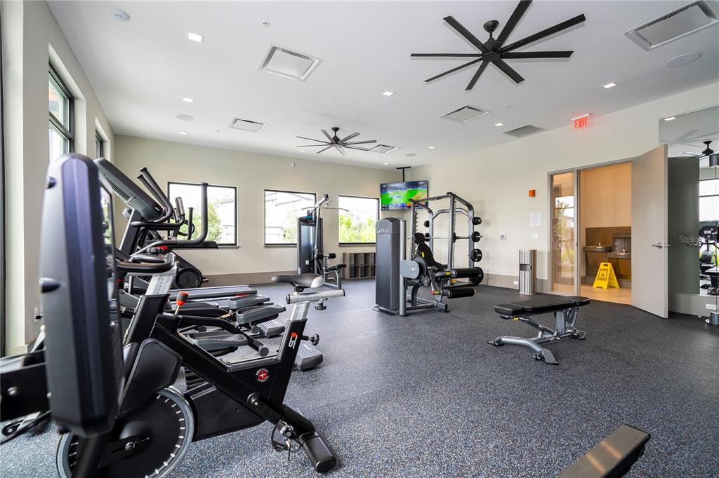 10592 Ebb Tide Lane Orlando, FL 32821 - Photo 78 of 85 a view of a room with gym equipment