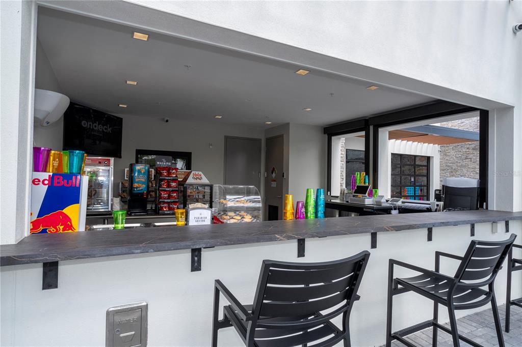 10592 Ebb Tide Lane Orlando, FL 32821 - Photo 80 of 85 a group of people sitting in living room