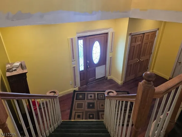 a view of a door with wooden floor
