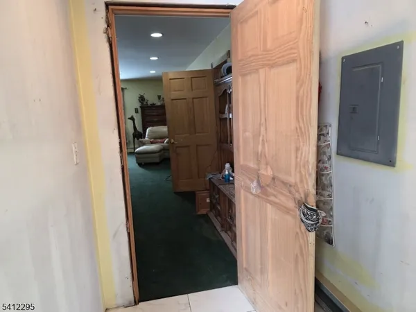 a bathroom with a glass door shower