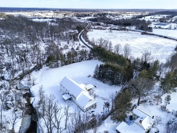 a view of a houses with a yard