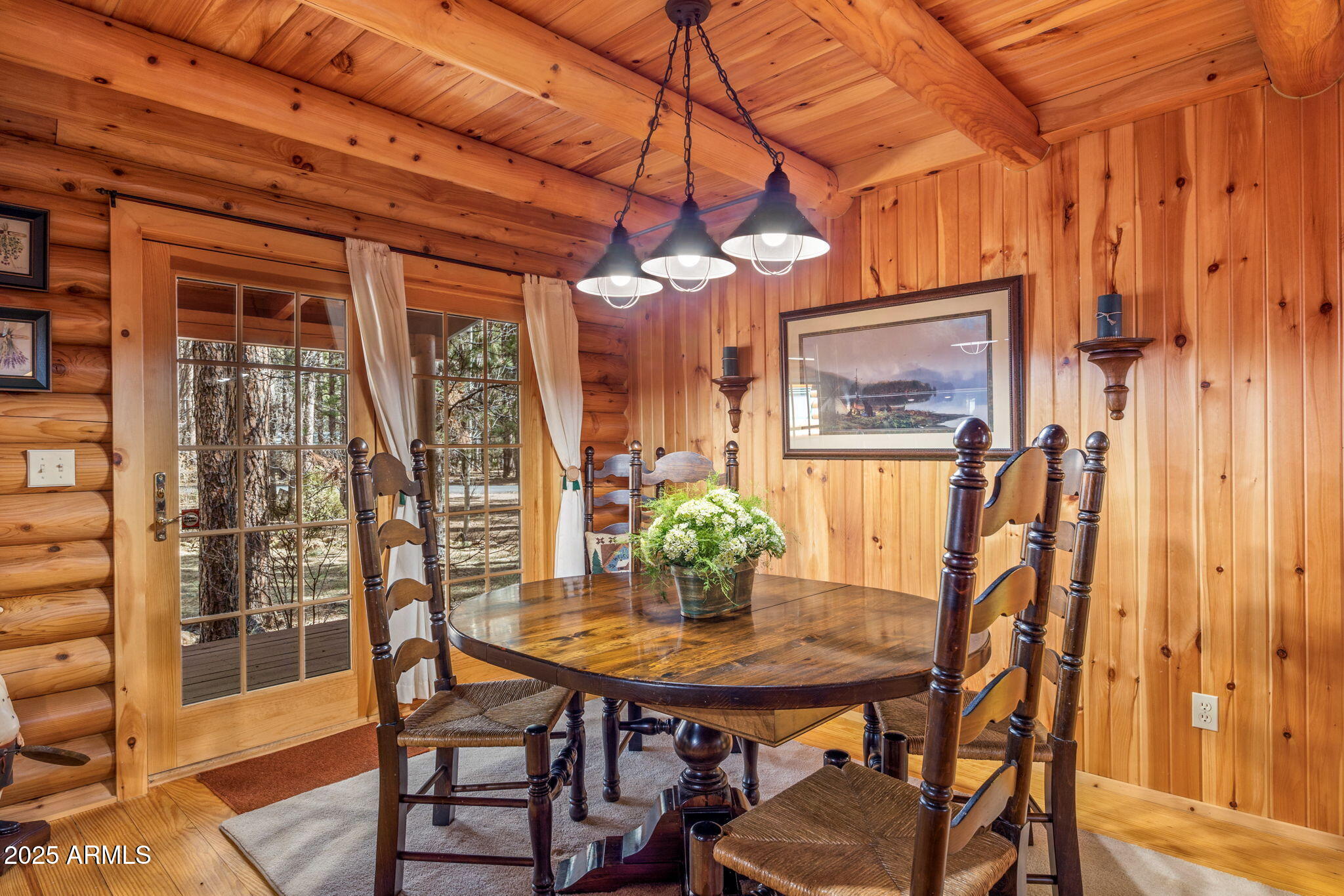 2677 Jackrabbit Drive Pinetop, AZ 85935 - Photo 9 of 87 a view of a dining room with furniture and wooden floor
