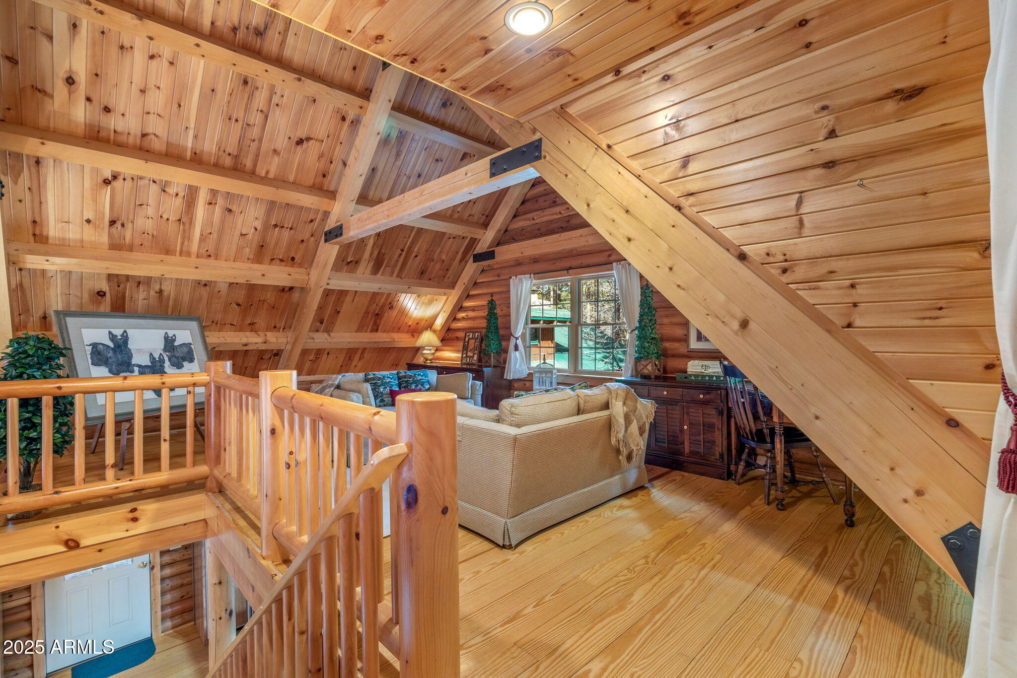 2677 Jackrabbit Drive Pinetop, AZ 85935 - Photo 11 of 87 a view of a roof deck with couches and wooden fence