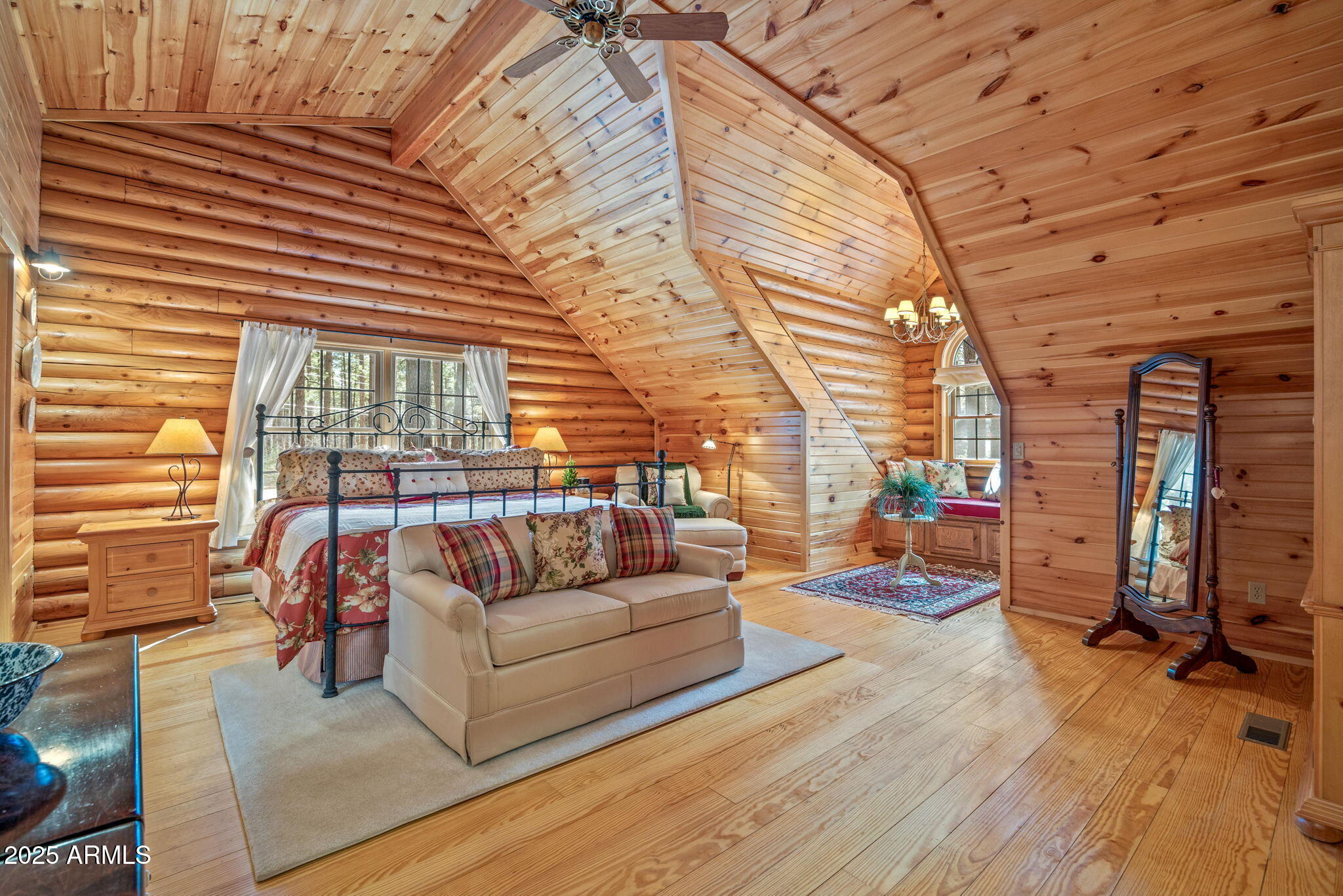 2677 Jackrabbit Drive Pinetop, AZ 85935 - Photo 13 of 87 a view of a patio with couches and potted plants