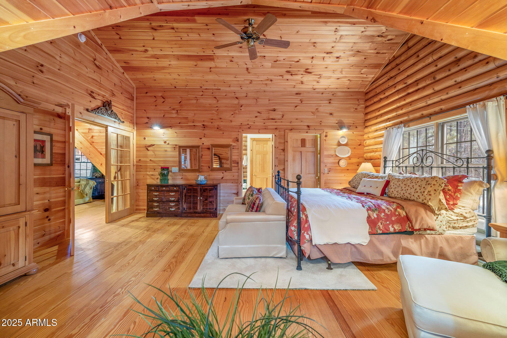 2677 Jackrabbit Drive Pinetop, AZ 85935 - Photo 14 of 87 a living room with furniture a flat screen tv and a table