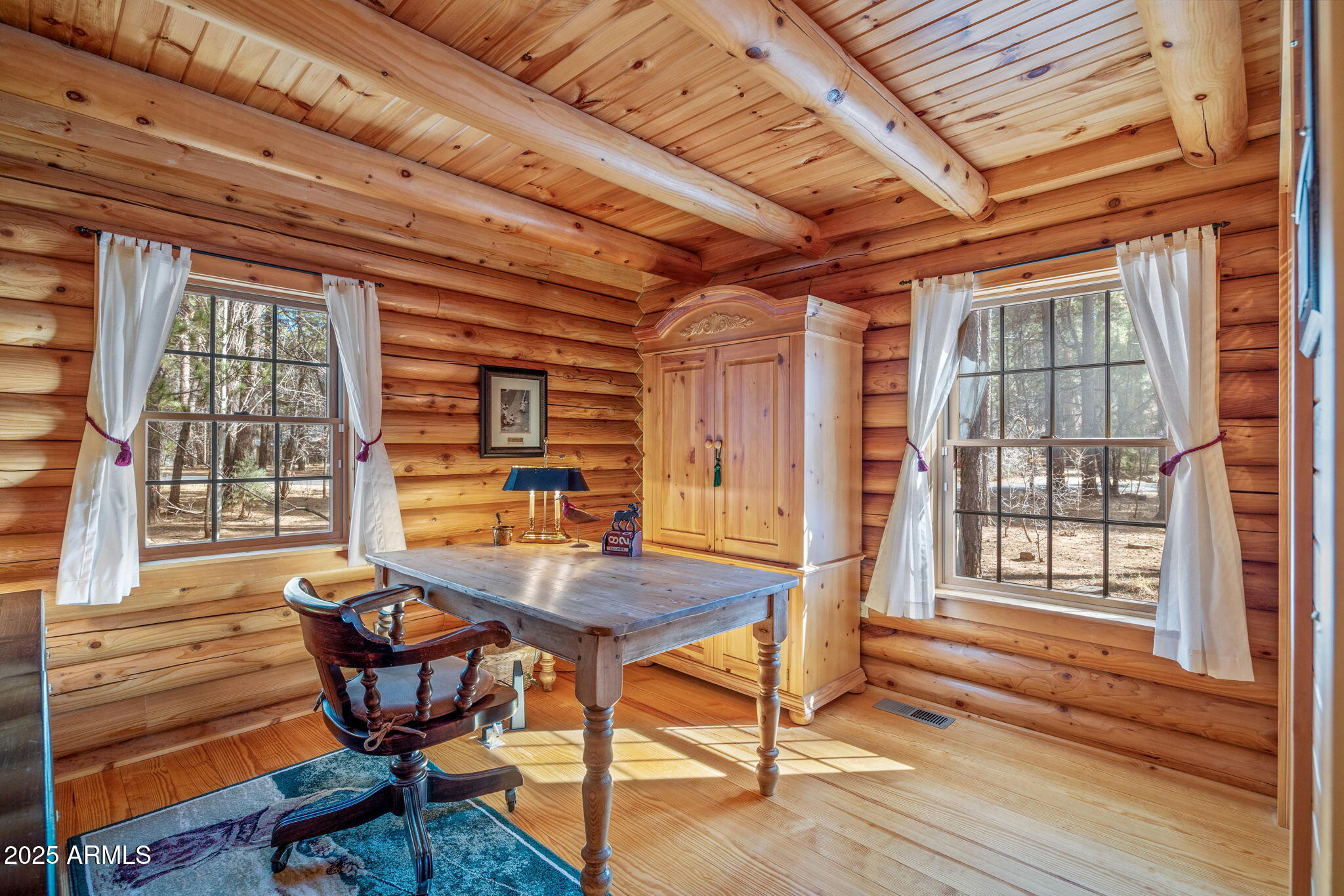 2677 Jackrabbit Drive Pinetop, AZ 85935 - Photo 26 of 87 a view of a dining room with furniture window and wooden floor