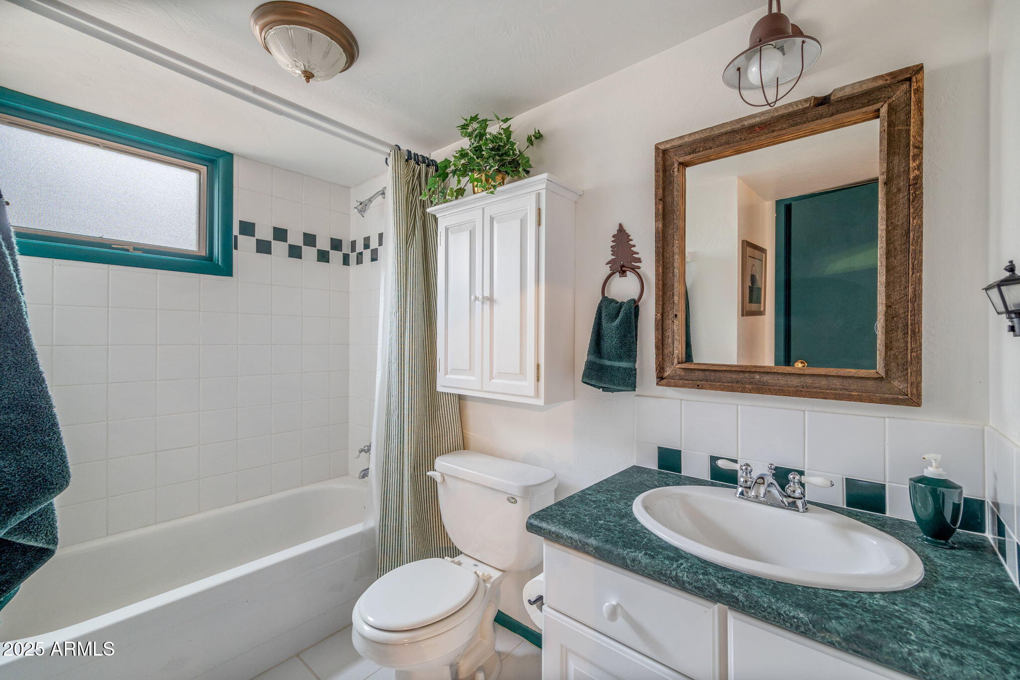 2677 Jackrabbit Drive Pinetop, AZ 85935 - Photo 40 of 87 a bathroom with a granite countertop sink a toilet a mirror and shower