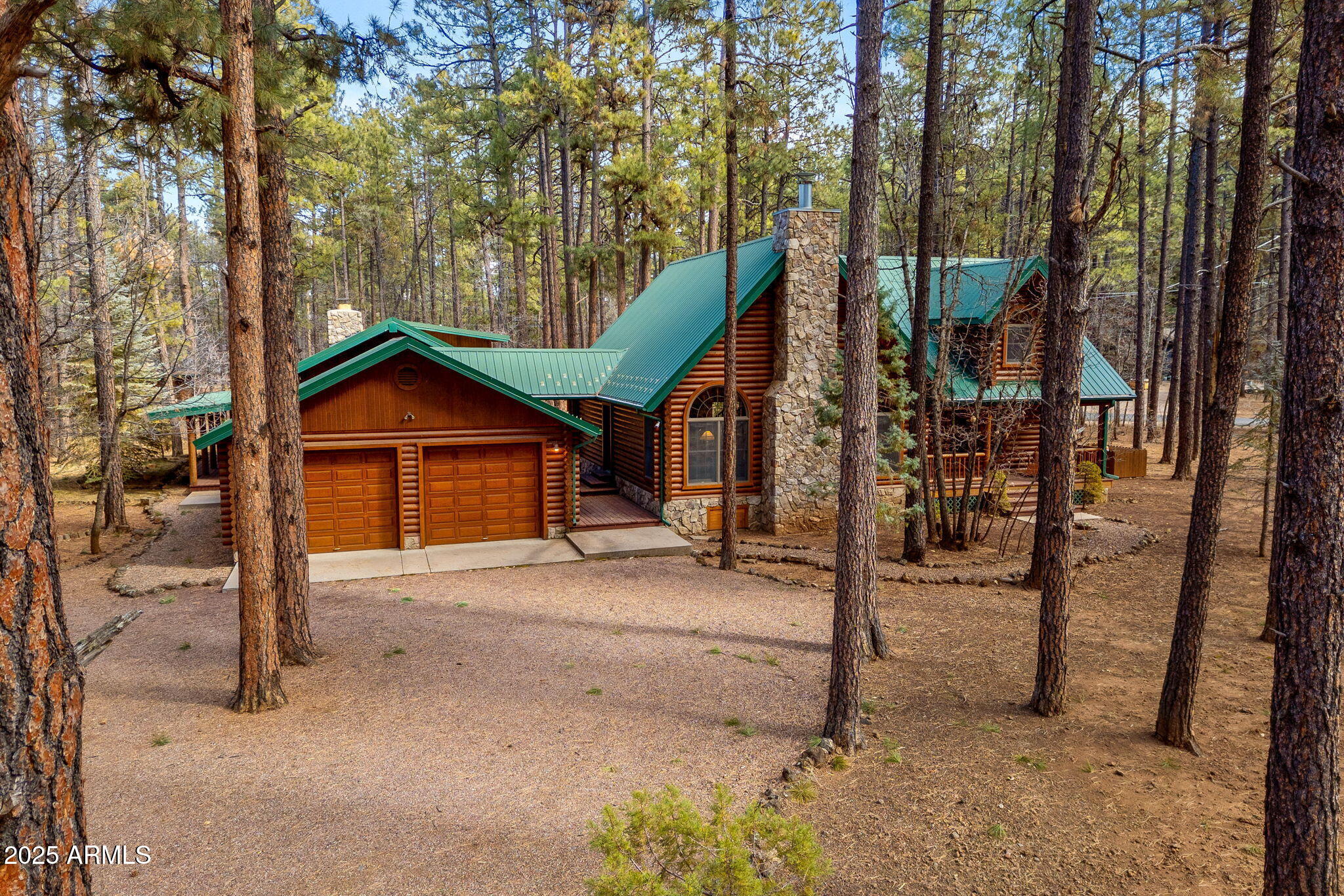 2677 Jackrabbit Drive Pinetop, AZ 85935 - Photo 48 of 87 a dirt road with trees in front of it