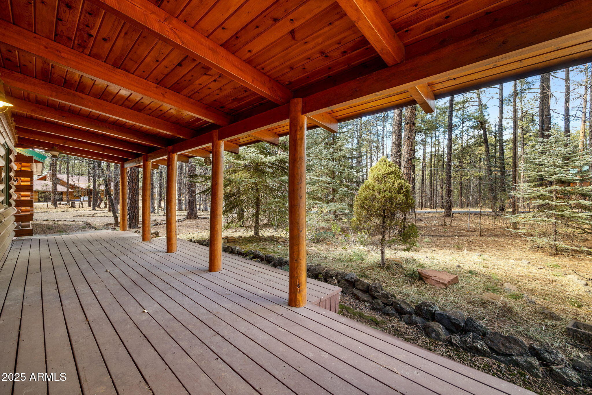 2677 Jackrabbit Drive Pinetop, AZ 85935 - Photo 53 of 87 a porch with wooden floor