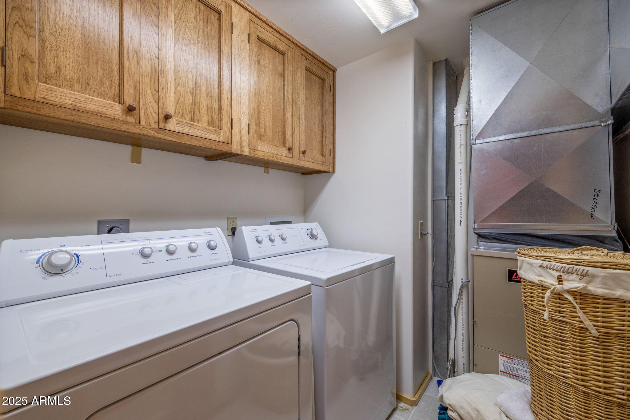 2677 Jackrabbit Drive Pinetop, AZ 85935 - Photo 55 of 87 a utility room with dryer and washer