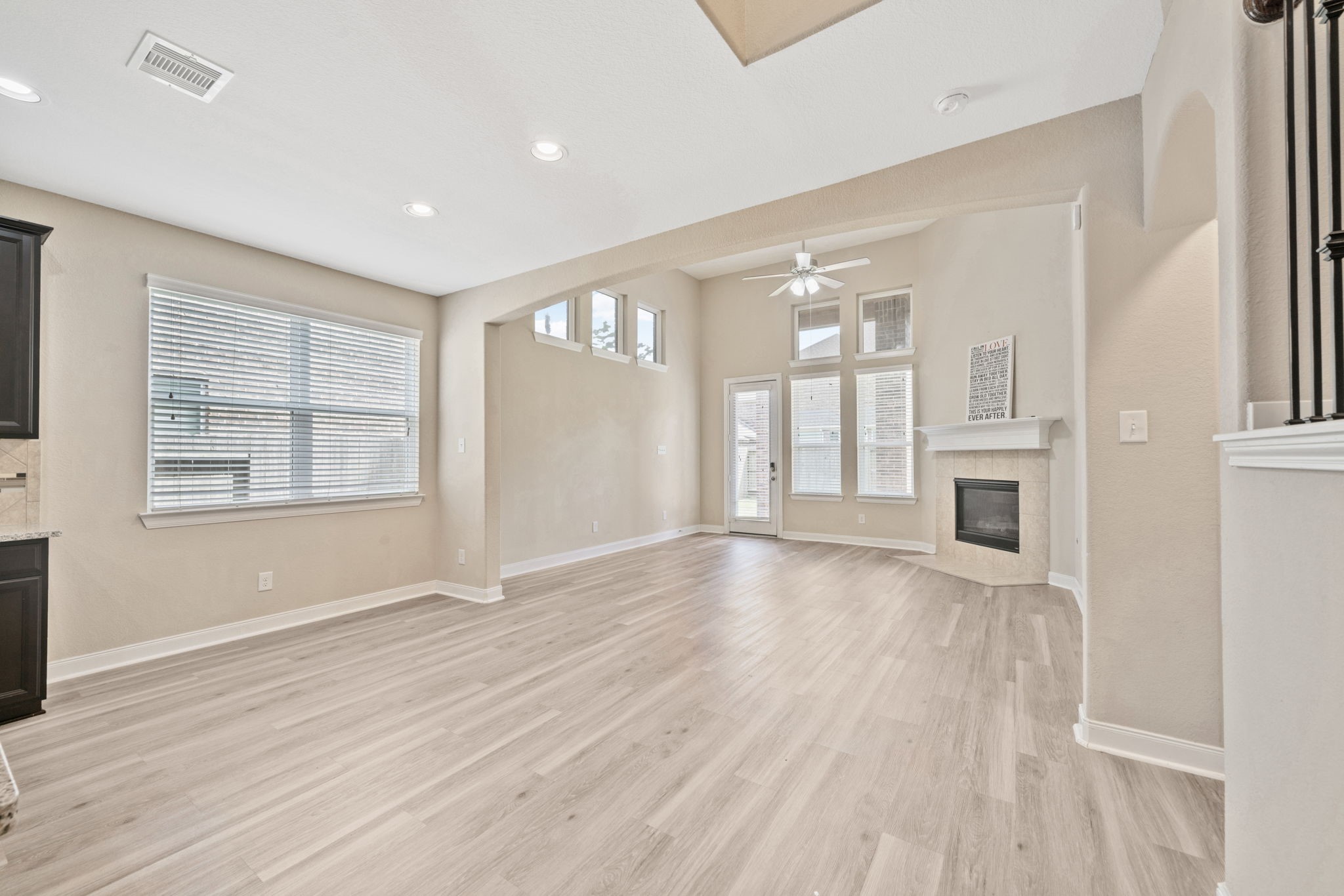 22523 Birch Ridge Meadow Drive Spring, TX 77389 - Photo 14 of 39 an empty room with wooden floor and windows
