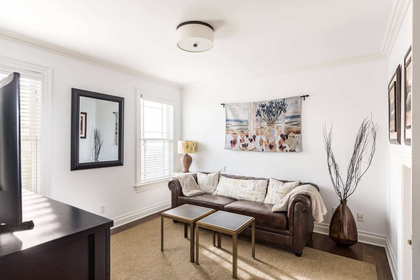 351 Kings Point Road East Hampton, NY 11937 - Photo 18 of 34 a living room with furniture and a window