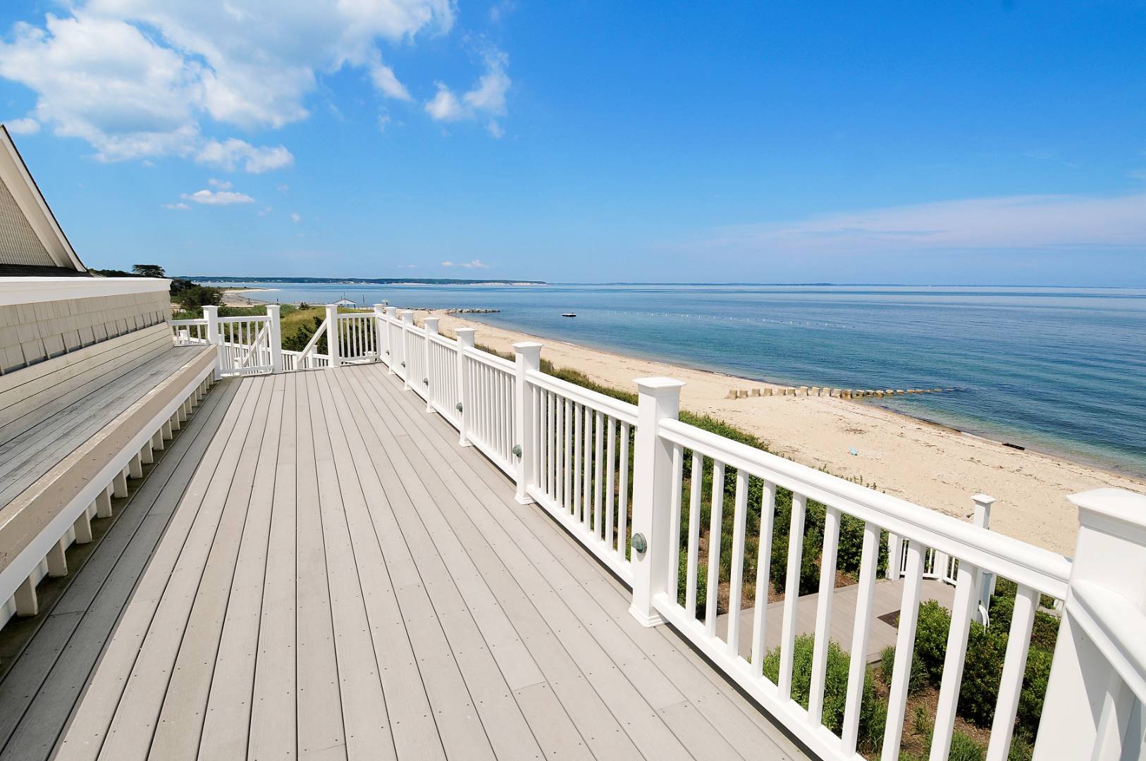 351 Kings Point Road East Hampton, NY 11937 - Photo 29 of 34 a view of balcony with wooden floor and fence