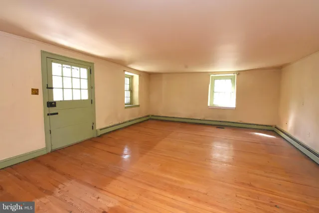 a view of a brick building with a large window