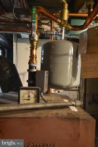 a view of a yard with large trees