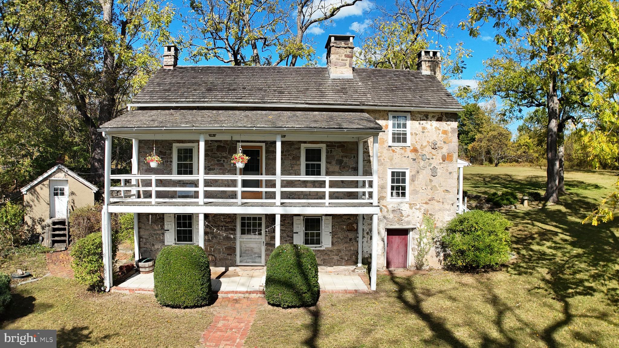 210 Buckwalter Road Phoenixville, PA 19460 - Photo 37 of 60 a front view of a house with a garden