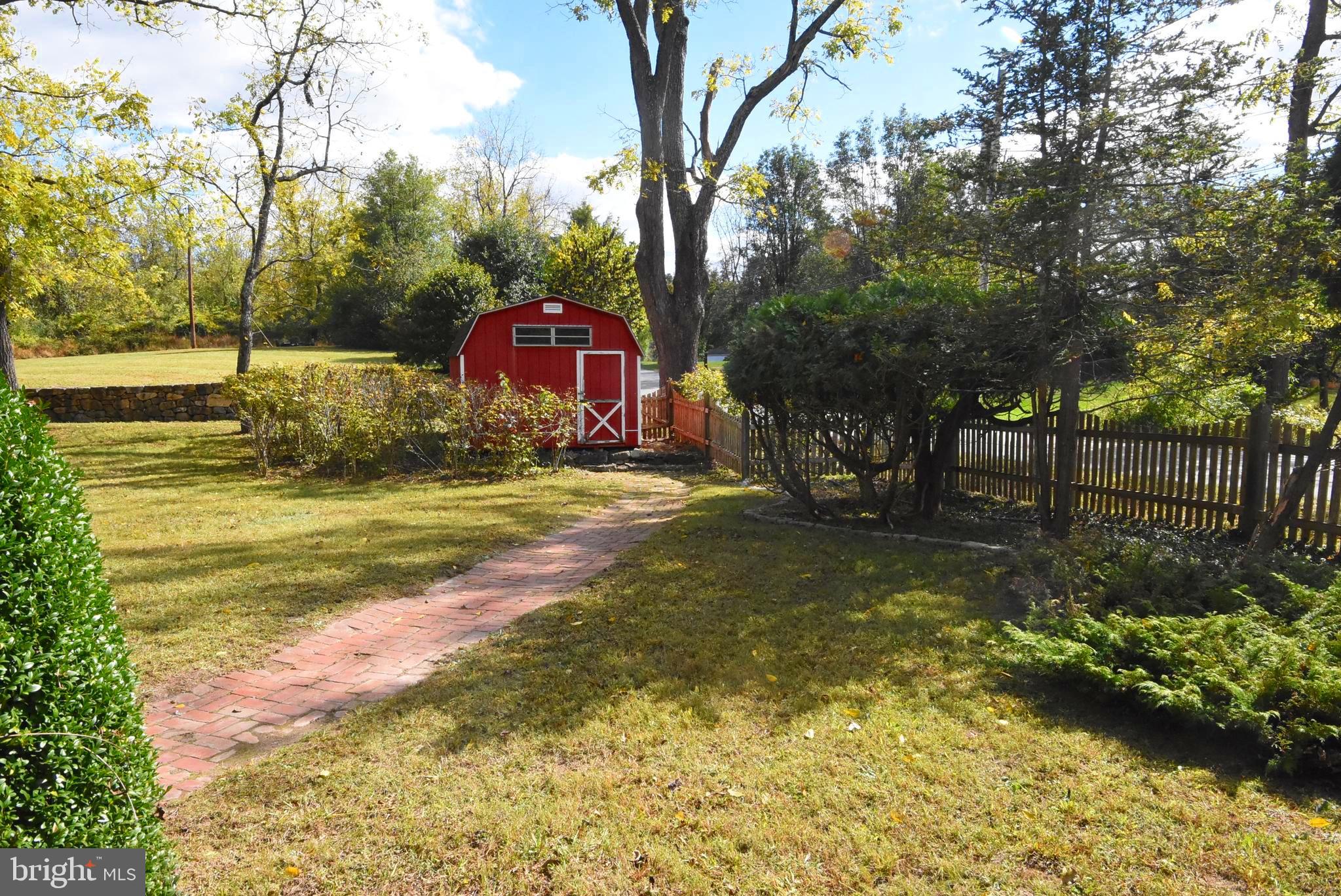 210 Buckwalter Road Phoenixville, PA 19460 - Photo 39 of 60 a view of a yard with large trees