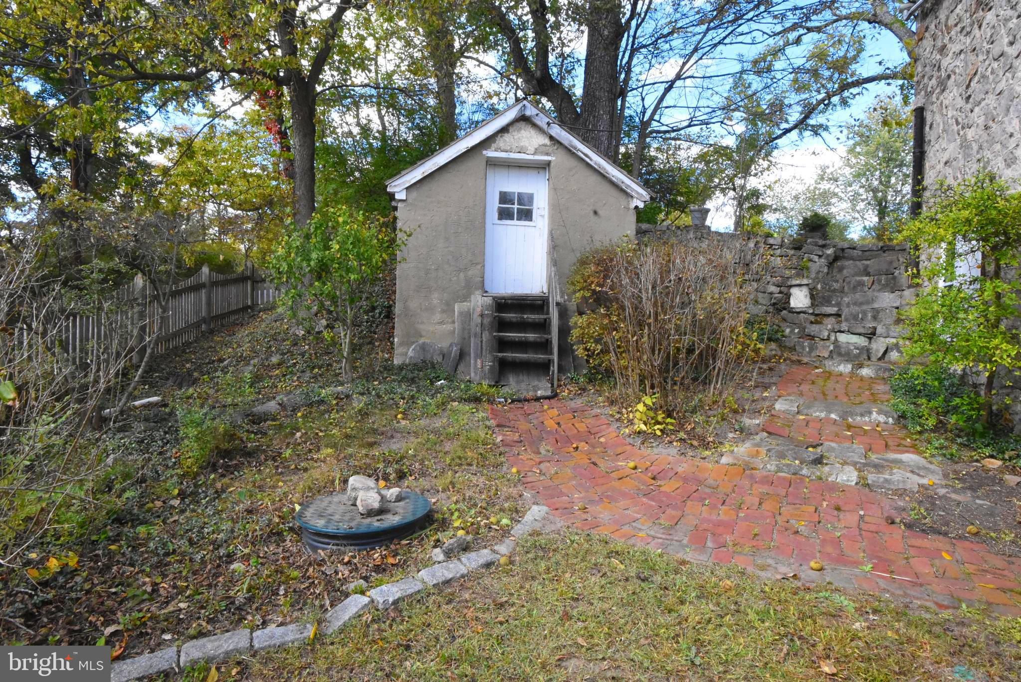 210 Buckwalter Road Phoenixville, PA 19460 - Photo 40 of 60 a view of a small house with a yard