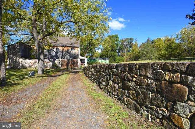 a view of a playground with basketball court