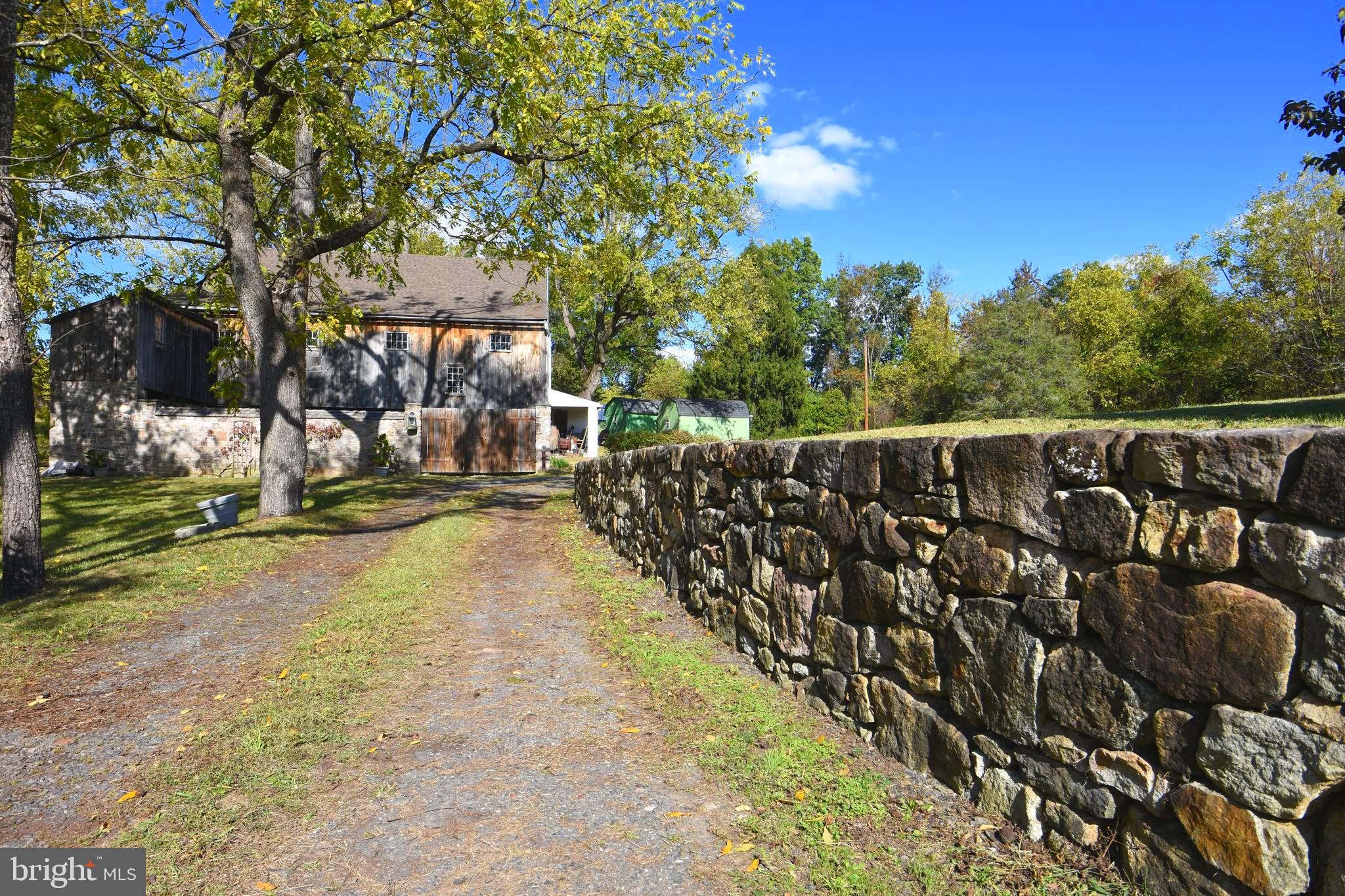 210 Buckwalter Road Phoenixville, PA 19460 - Photo 4 of 60 a view of a backyard of the house