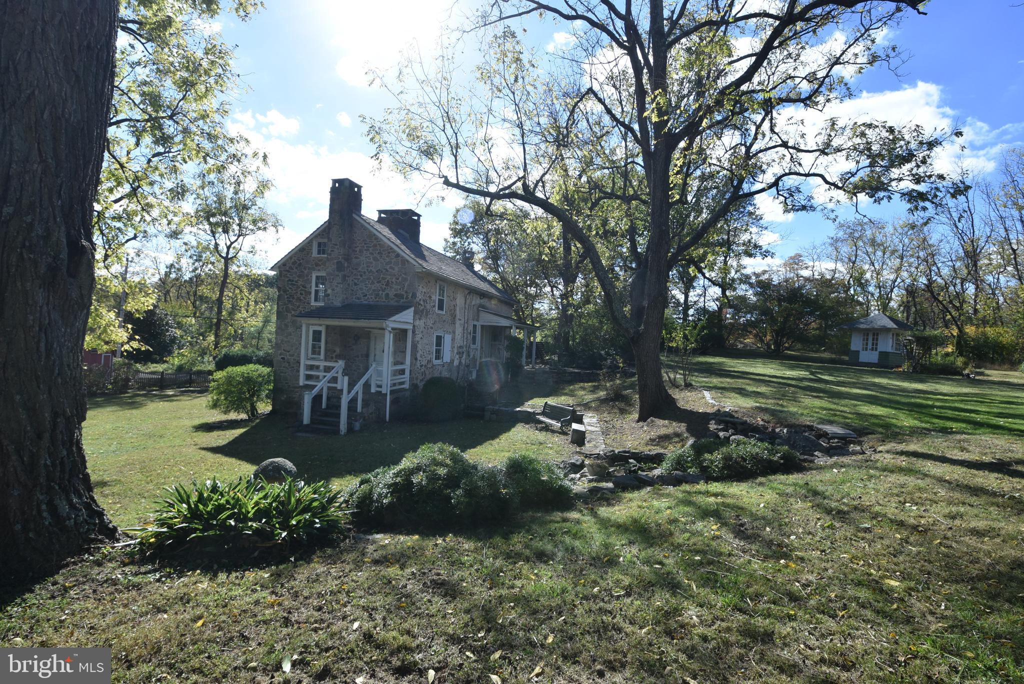 210 Buckwalter Road Phoenixville, PA 19460 - Photo 45 of 60 a front view of a house with garden