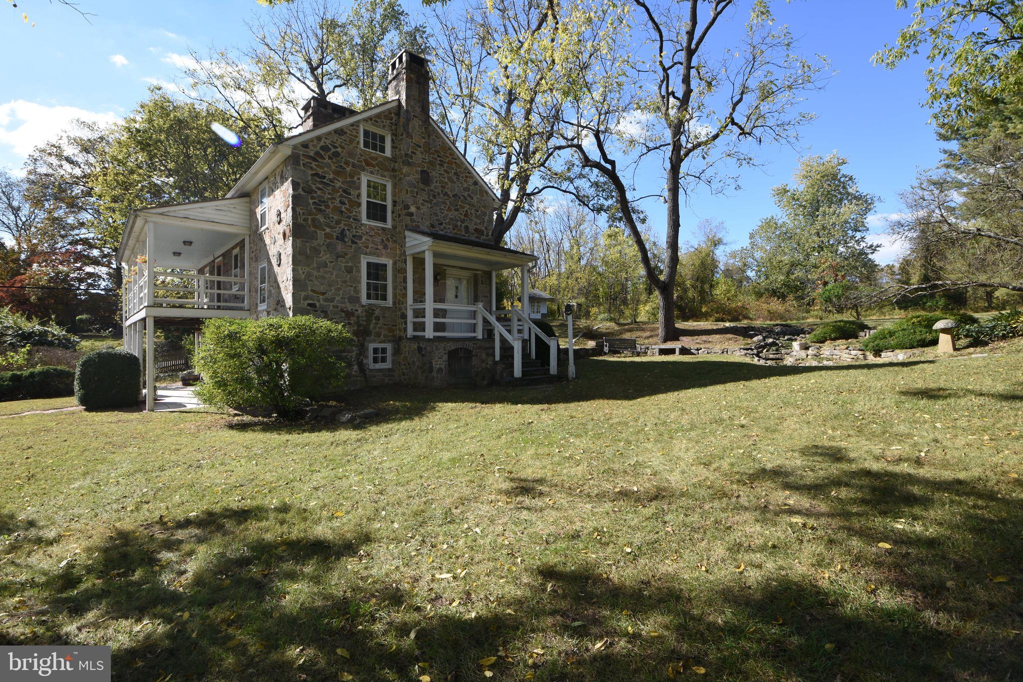 210 Buckwalter Road Phoenixville, PA 19460 - Photo 47 of 60 a front view of a house with a yard and garage
