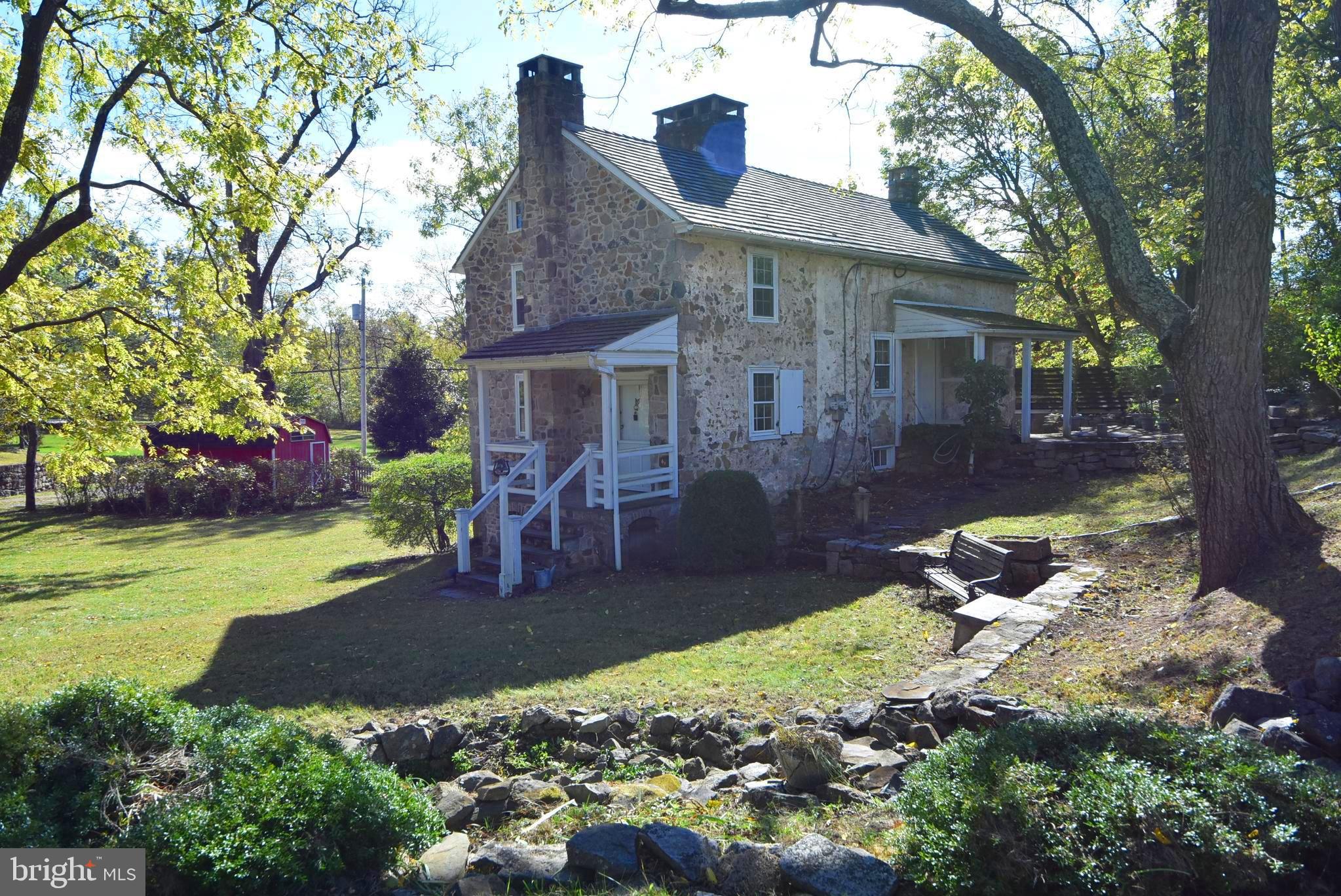210 Buckwalter Road Phoenixville, PA 19460 - Photo 7 of 60 a front view of a house with garden