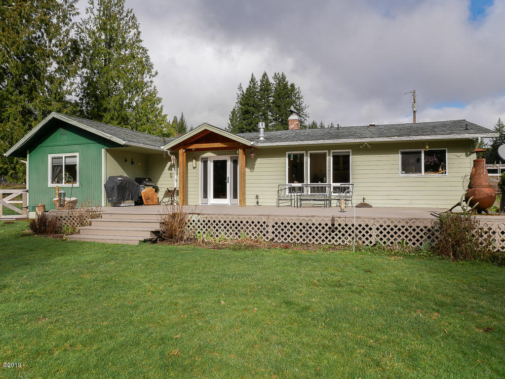 4109 Logsden Road Siletz, OR 97380 - Photo 2 of 40 Front of home w/ big deck