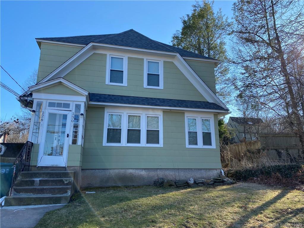 128 Augur Street Hamden, CT 06517 - Photo 1 of 1 a front view of a house with a yard
